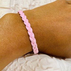 Pink braided bracelet piece